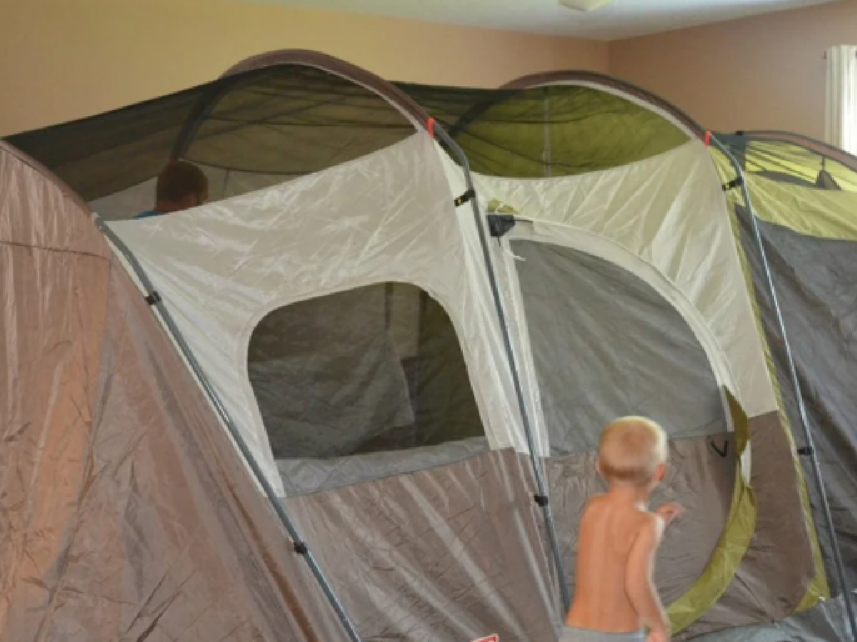 Staycation Ideas- Tent inside with children running - Kids Activities Blog