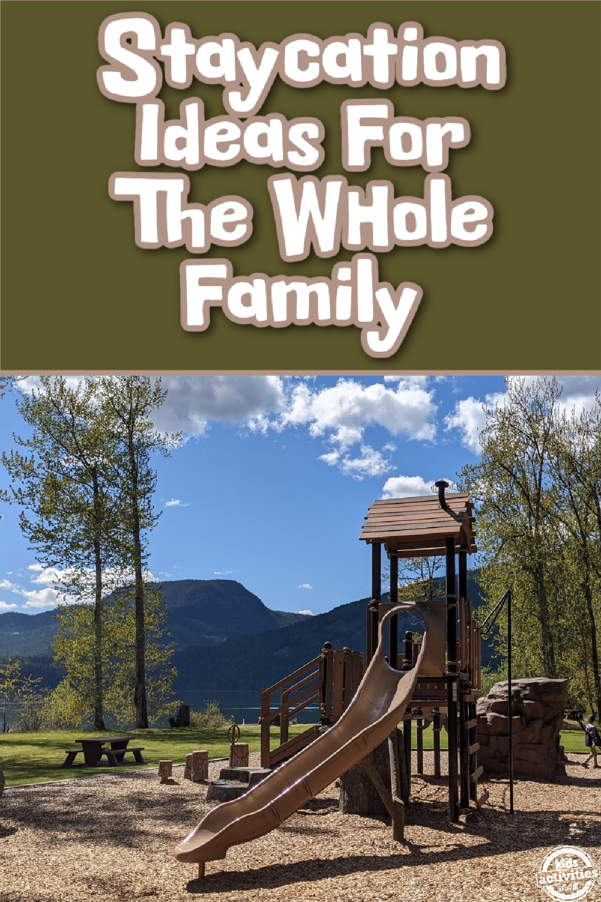 Staycation Ideas- blue sky with clouds and park with trees and mountain- Kids Activities Blog