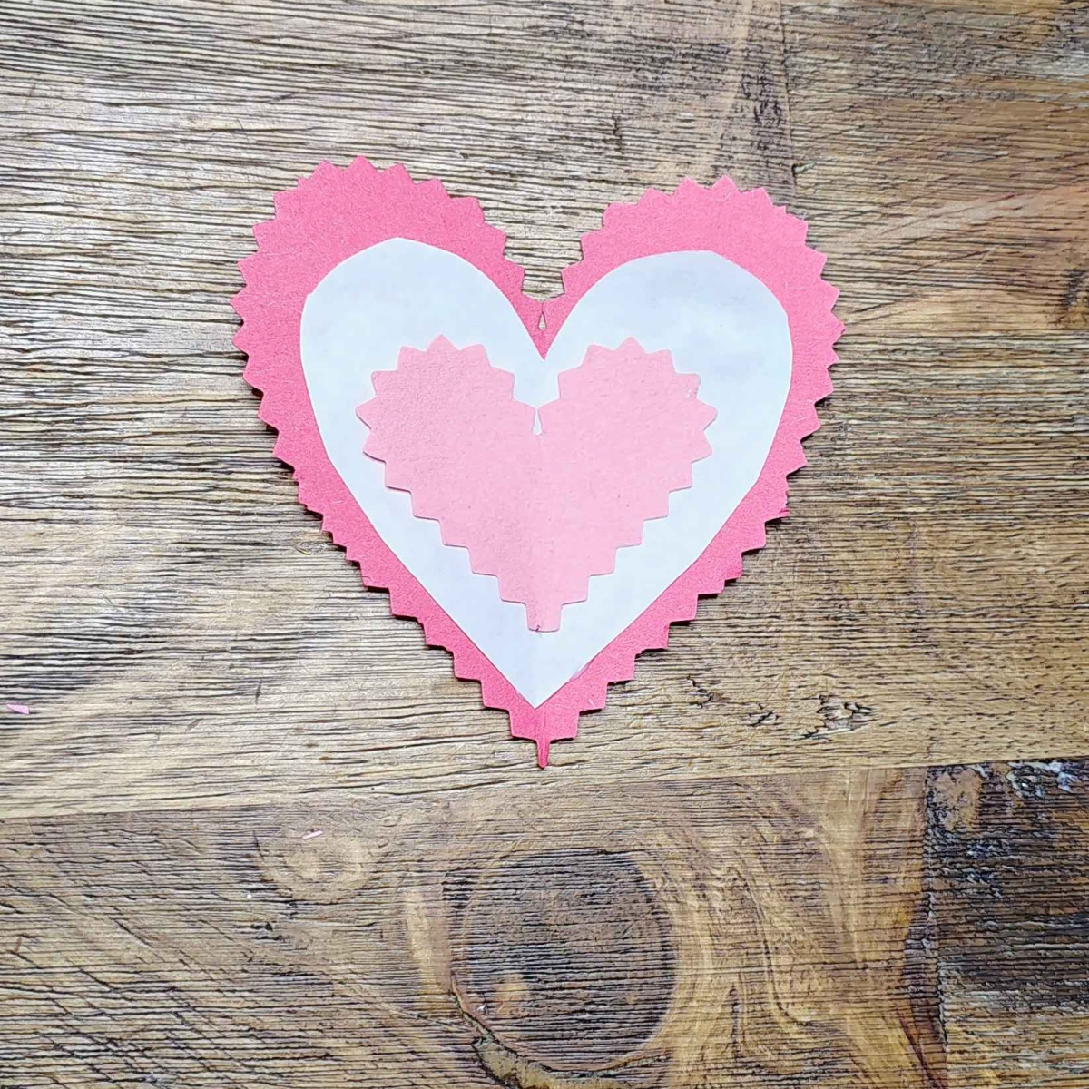 Key To My Heart Craft- Step 5 - Cut out an even smaller heart and glue it on the other two hearts- Kids Activities Blog
