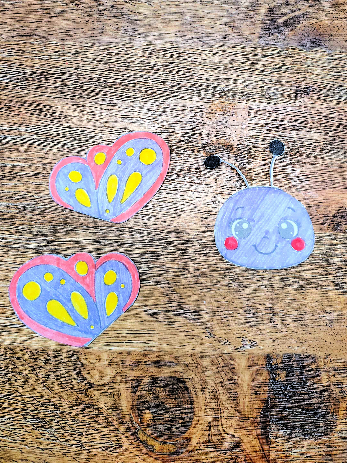 Butterfly Craft- Step 1 - Color the butterfly wings and head cut them out- Kids Activities Blog