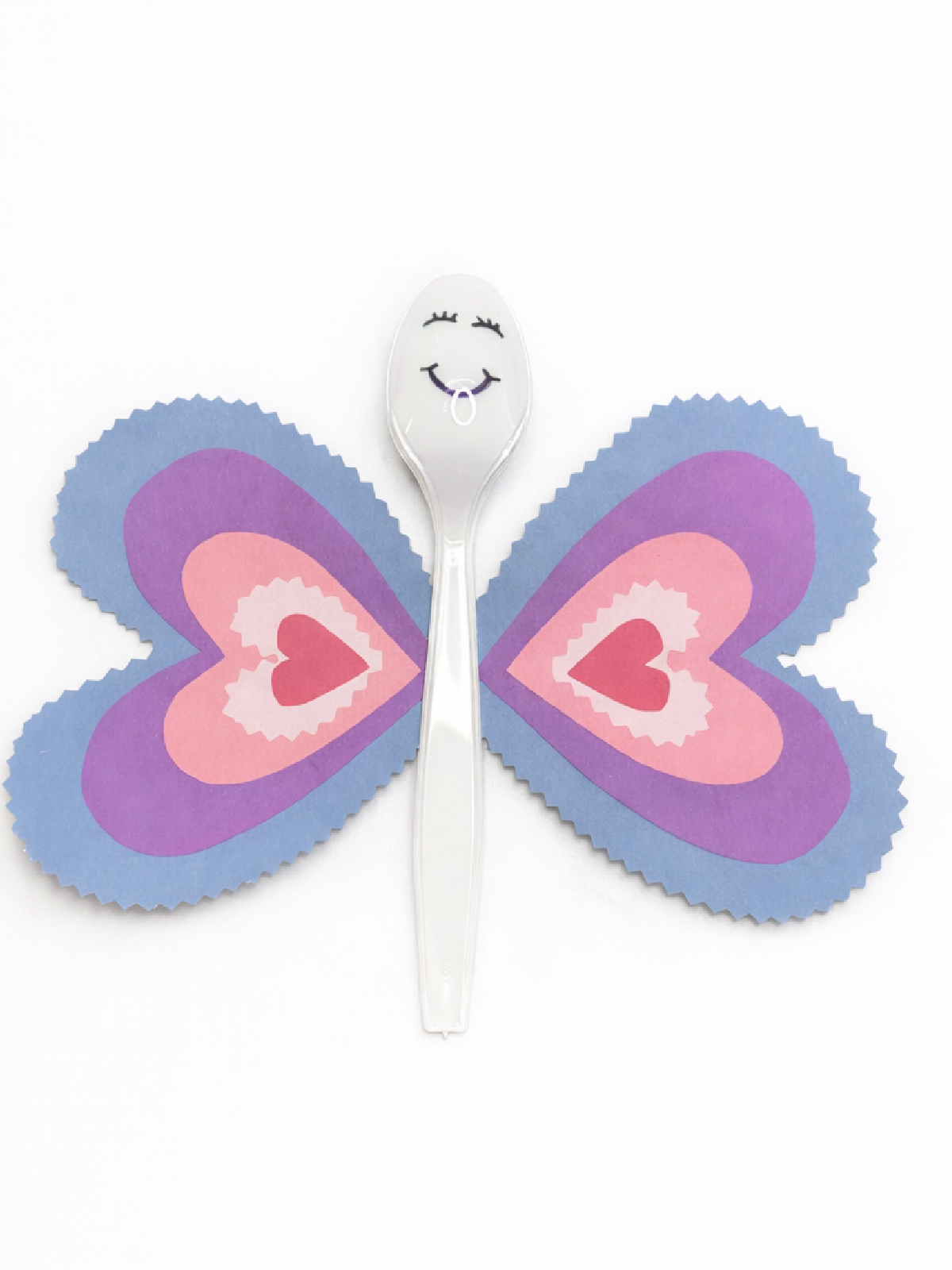 Butterfly Craft- Step 4- Spoon with heart wings one white background- Kids Activities Blog