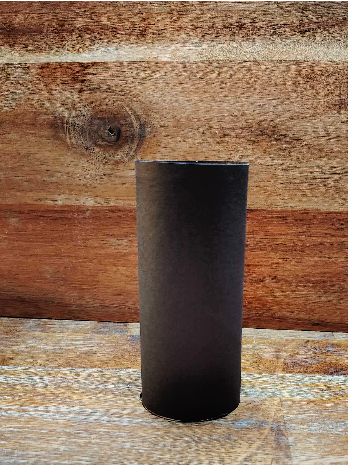 Ladybug Craft- Step 3- Black construction glued to toilet paper roll- Kids Activities Blog