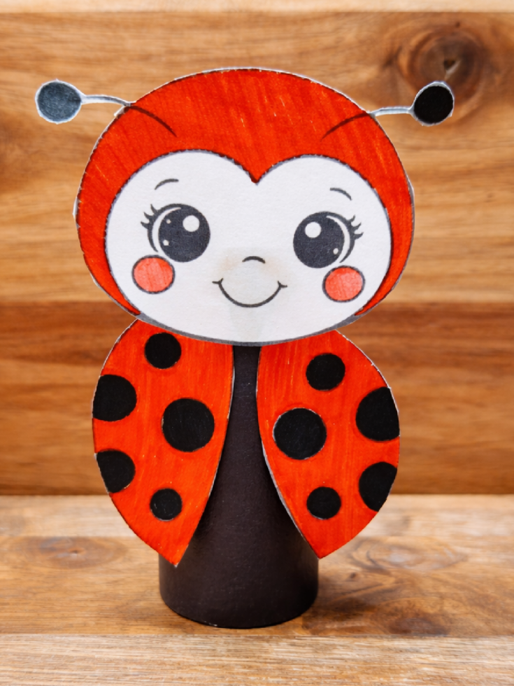 Ladybug Craft- Step 4- Glue on head and wings of lady bug- Kids Activities Blog