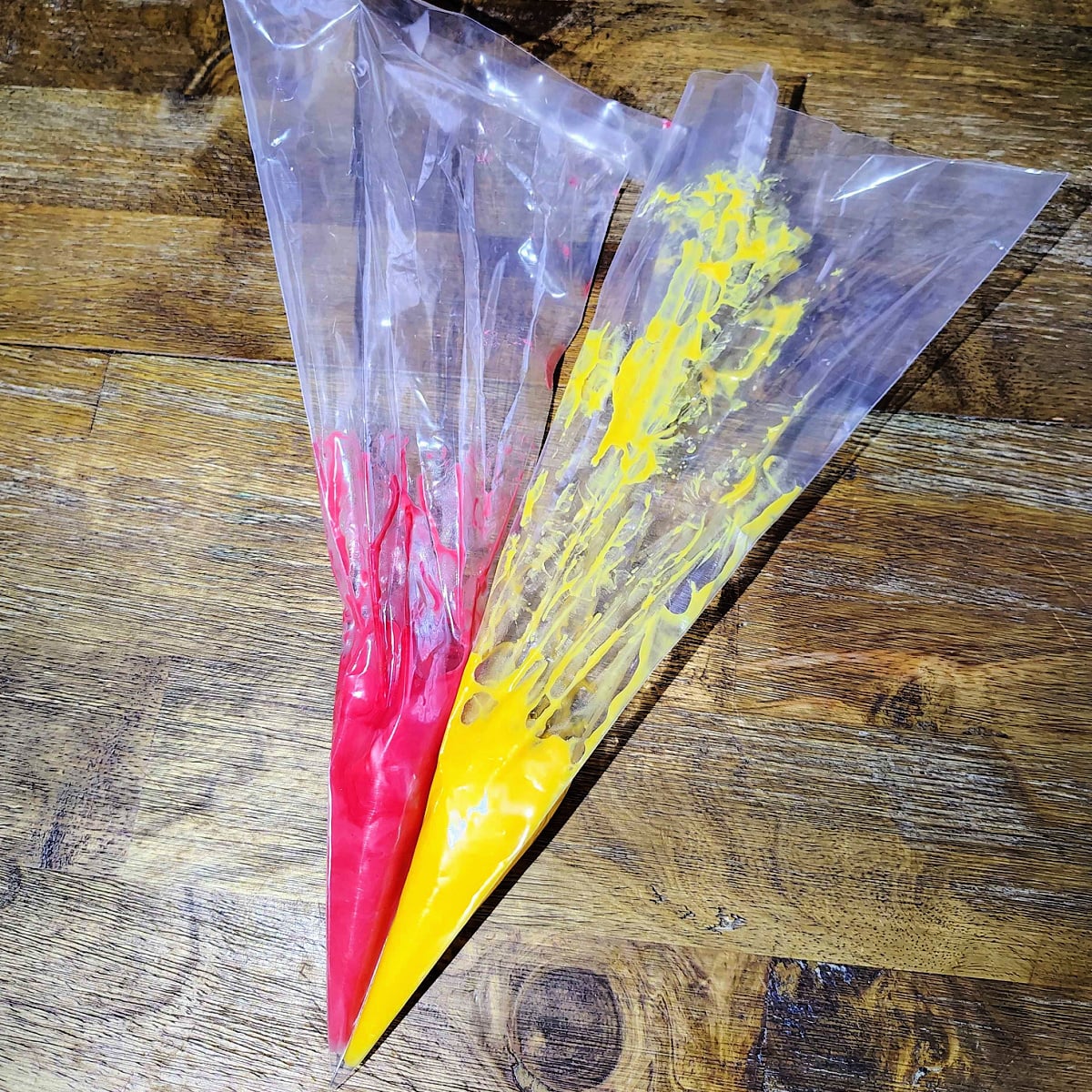 Twinkie Corn Dog- Step 2- Add your red and yellow frosting to piping bags -Kids Activities Blog