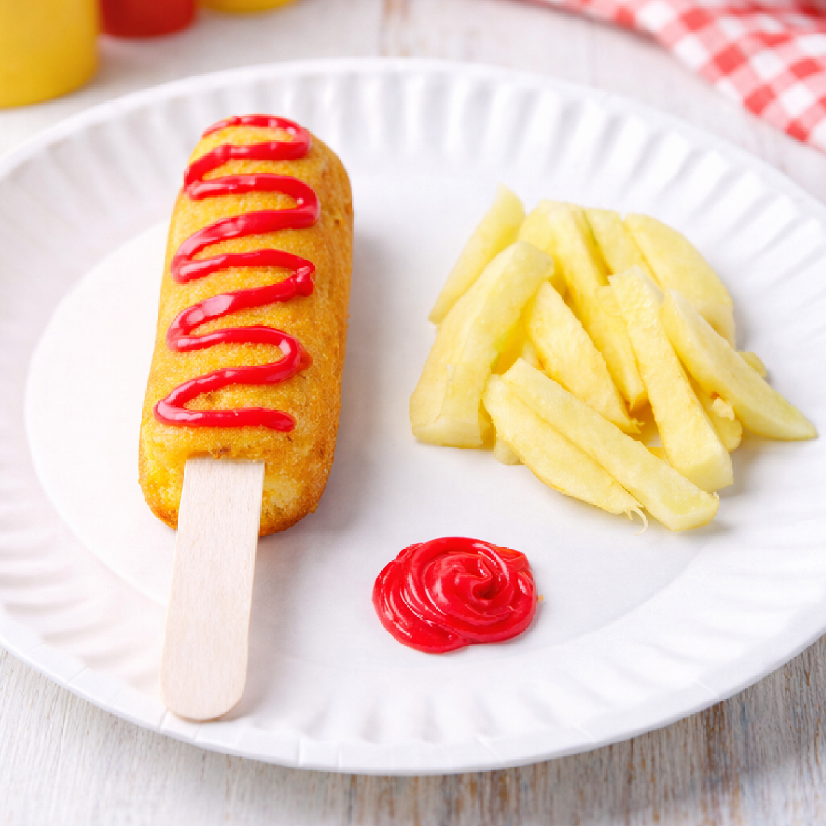 Twinkie Corn Dog- Completed - "ketchup" on the corn dog with apples and more ketchup -Kids Activities Blog