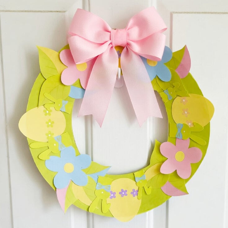 Easter Wreath- Finished- green with flowers, eggs, bunnies, leaves, and bow- kids activities blog