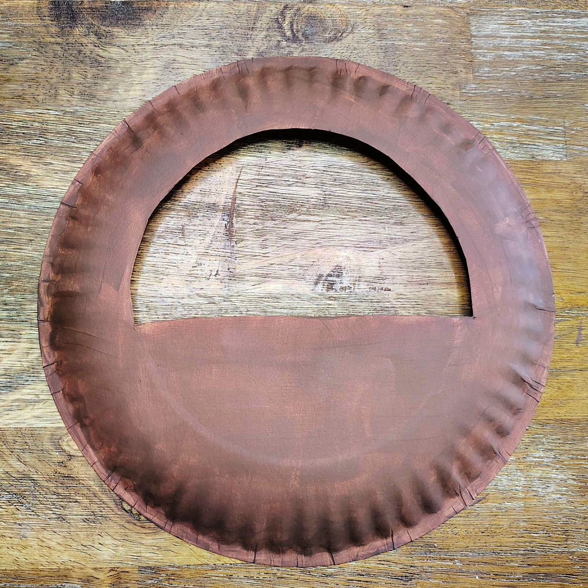 Flower basket craft- Step 3- Paint paper plate brown- Kids Activities Blog