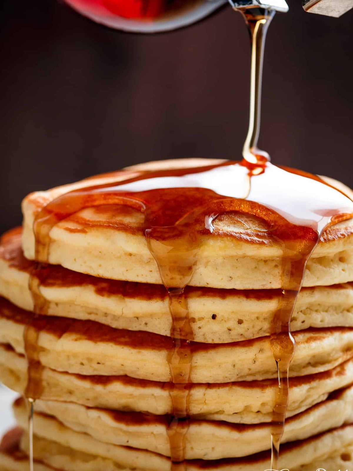 Mother's Day Breakfast Recipes- stack of pancakes with syrup - Kids Activities Blog