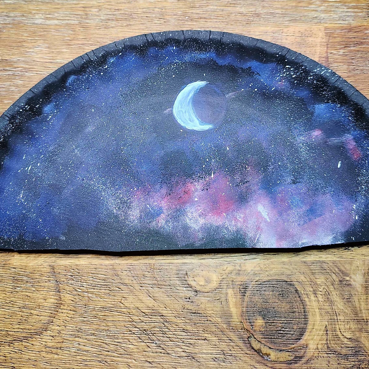 Paper Plate Fan- Step 10- Add a little more white to the left side to make the crescent moon a little more defines.-Kids Activities Blog