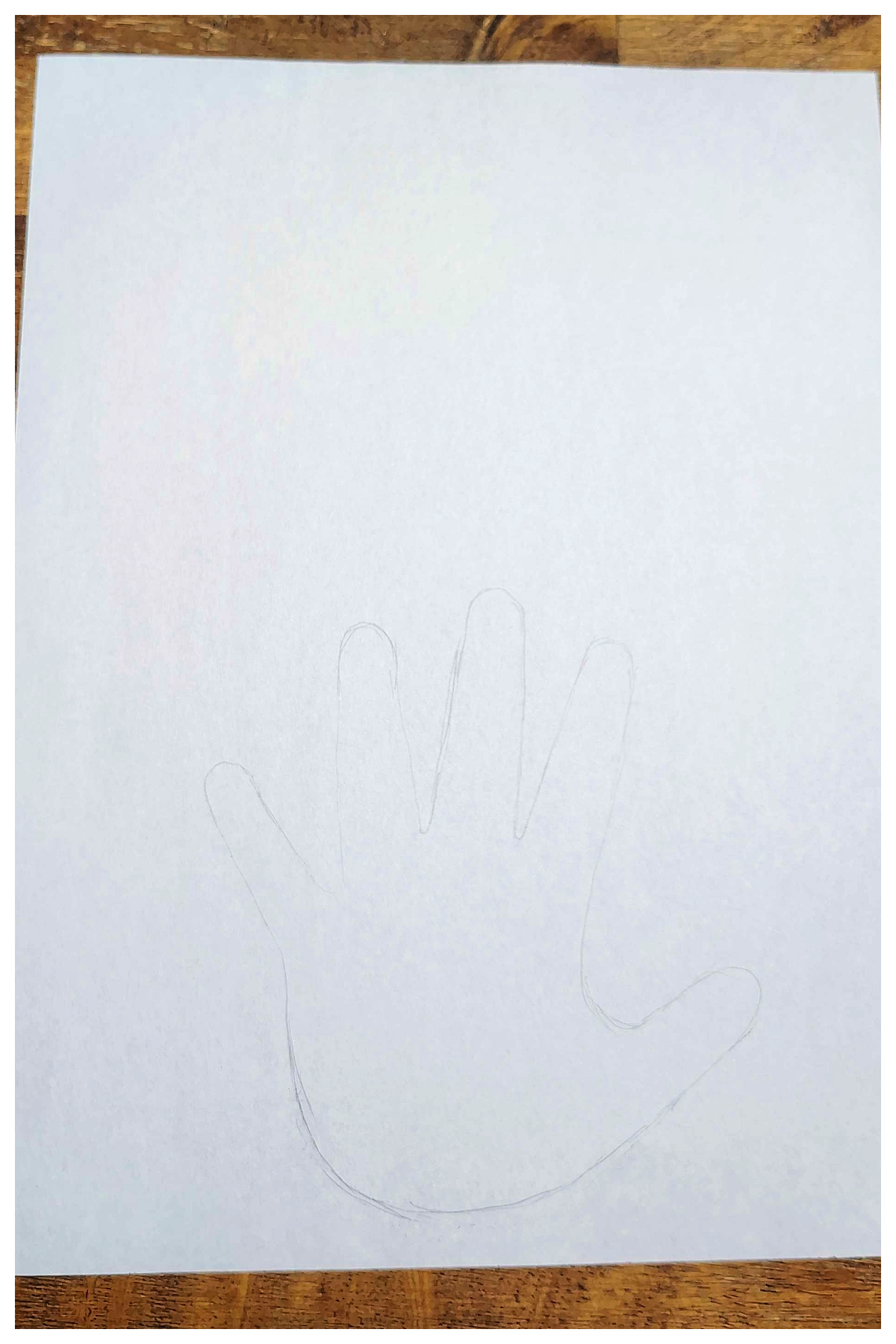 4th of July Craft- Step 1- Trace and cut out hand-Kids Activities Blog