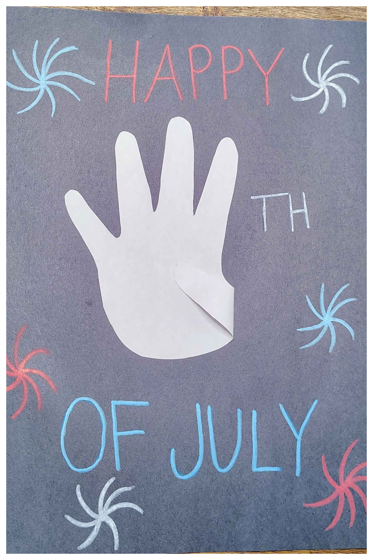 4th of July Craft- Step 5- fire works drawn in red white and blue -Kids Activities Blog