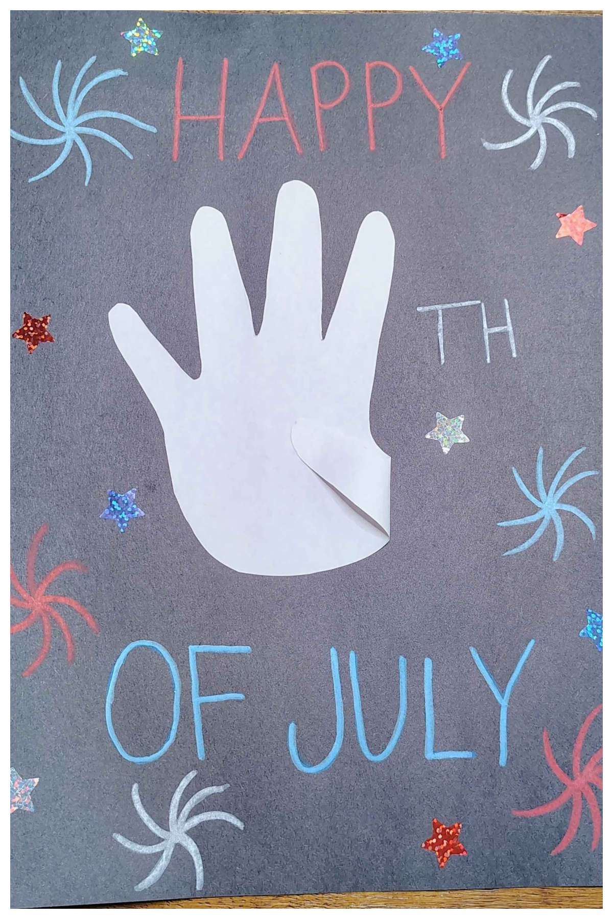4th of July Craft- Step 6- Add red white and blue stickers -Kids Activities Blog