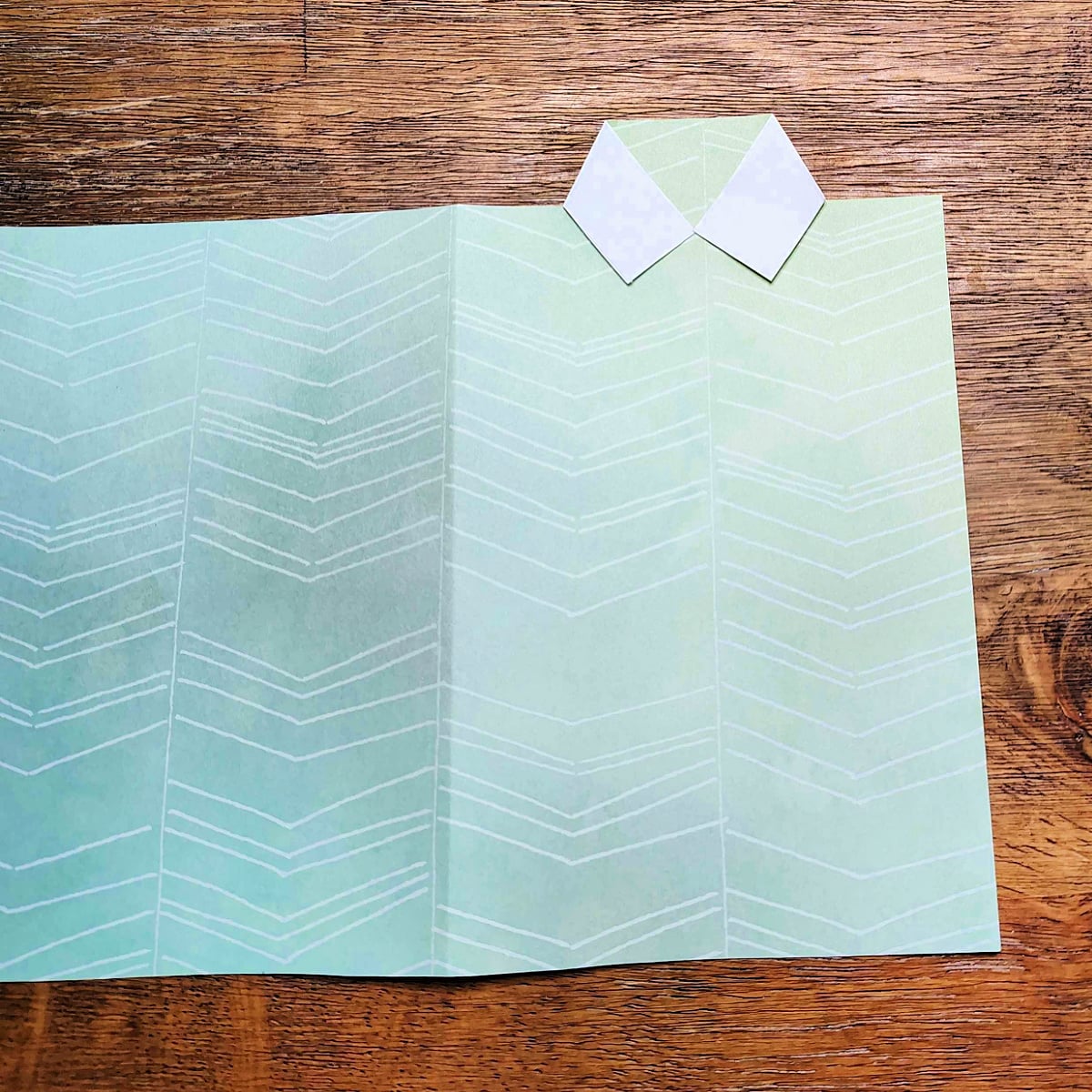Homemade Father's Day Card- Step 5 - White tabs folded over green paper- Kids Activities Blog