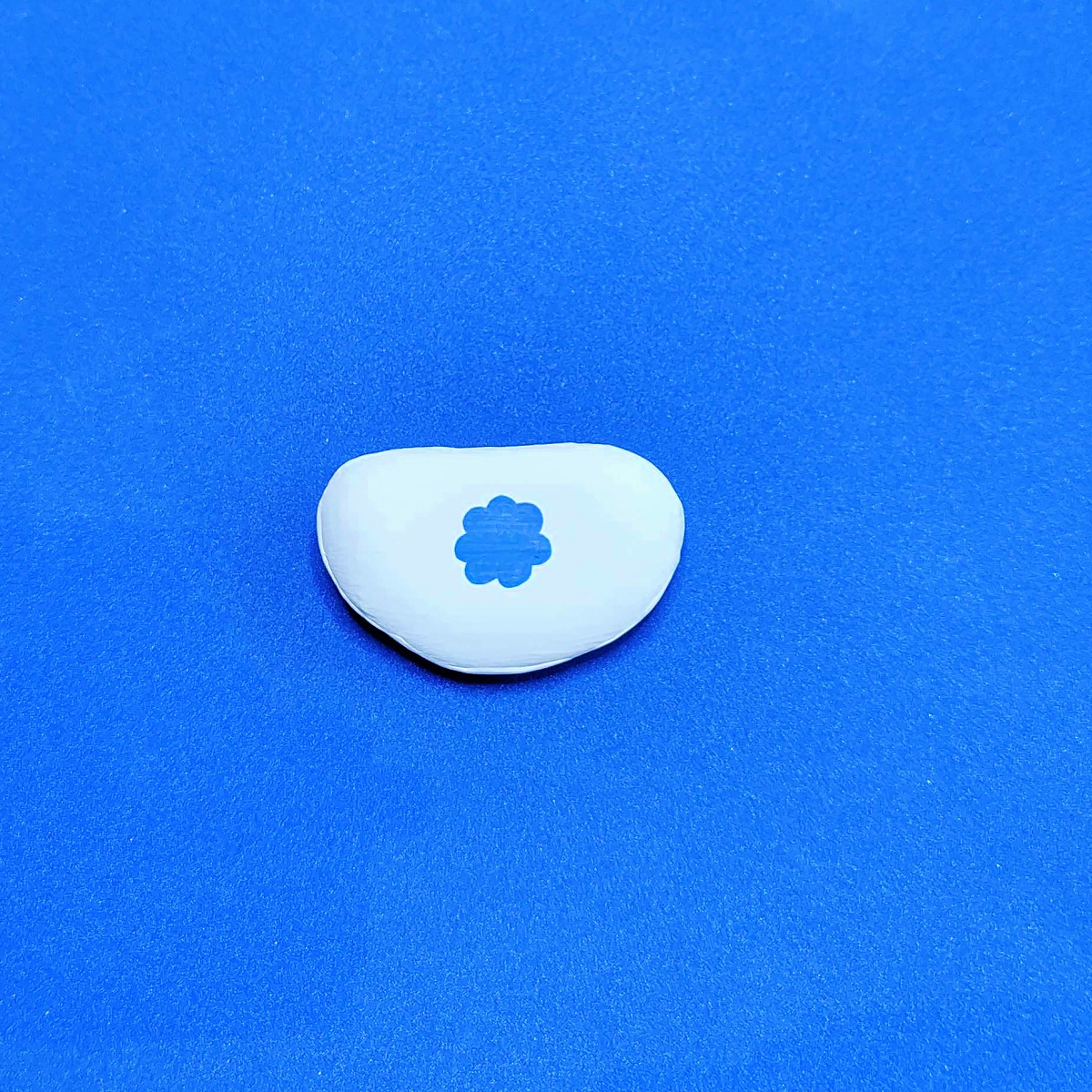 Patriotic Rock Painting Craft- Step 2 - Blue flower on white rock-Kids Activities Blog