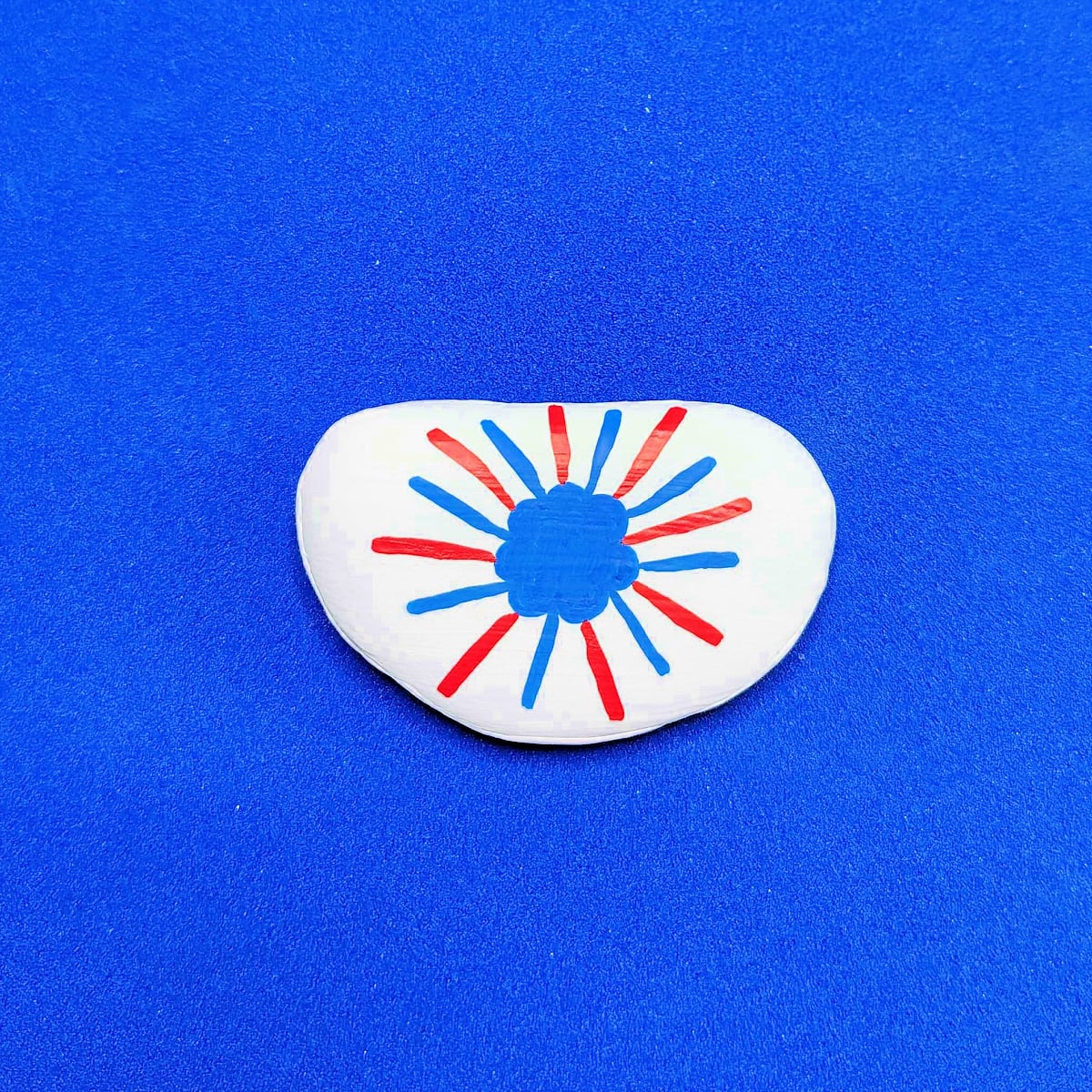 Patriotic Rock Painting Craft- Step 4- 8 red lines drawn -Kids Activities Blog