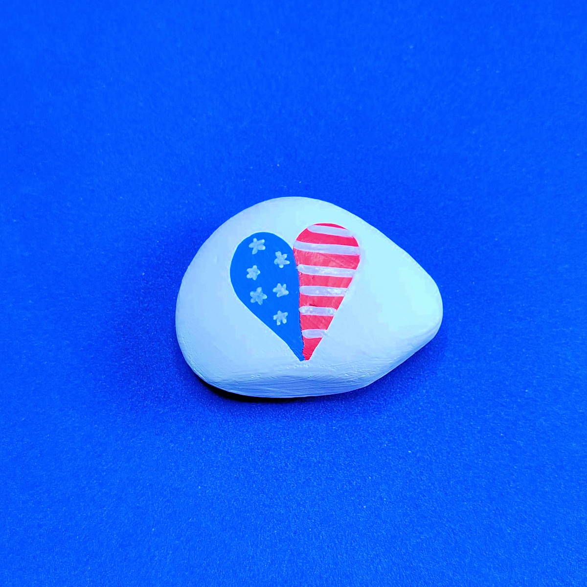 Patriotic Rock Painting Craft- White rock with heart and blue with white stars and red and white stripes-Kids Activities Blog