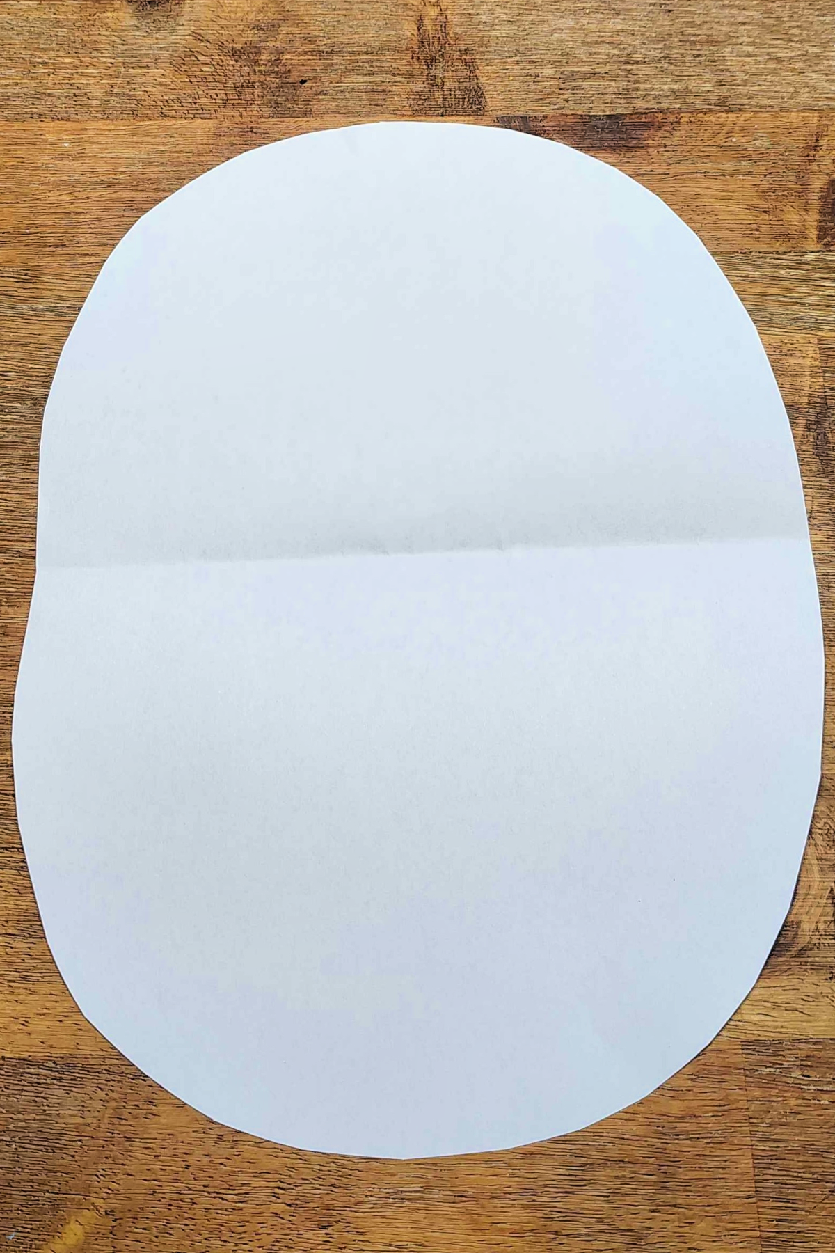 Watermelon Craft- Step 2- Oval cut out-Kids Activities Blog