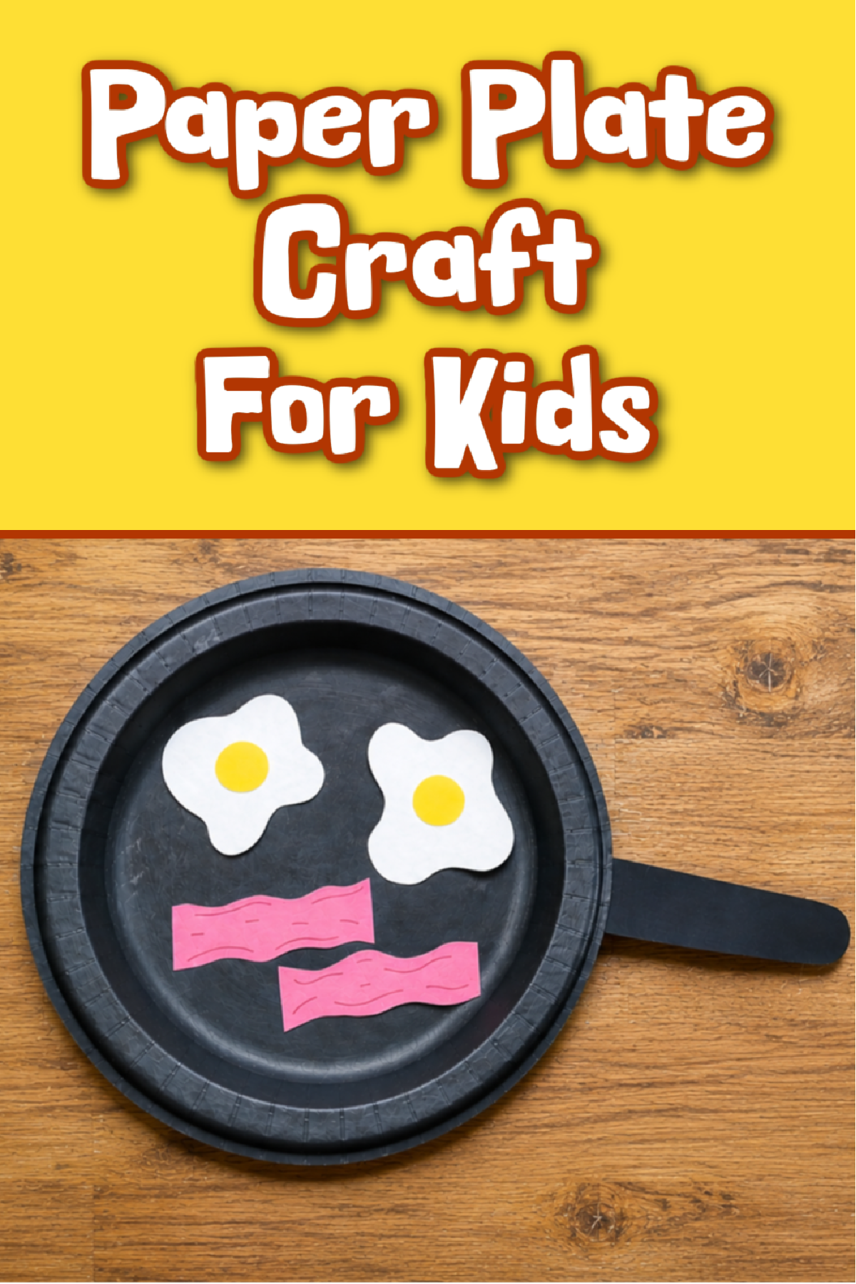 Breakfast Paper Plate Craft- black paper plate pan with paper eggs and bacon on wood and yellow background and text - Kids Activities Blog
