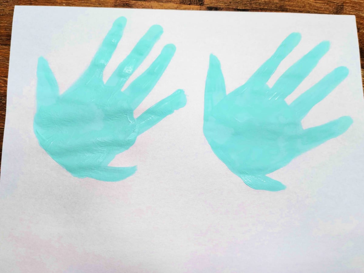 Jesus Feeds The 5000 Craft- Step 2 - Paint the hands in and add a bottom fin- Kids Activities Blog