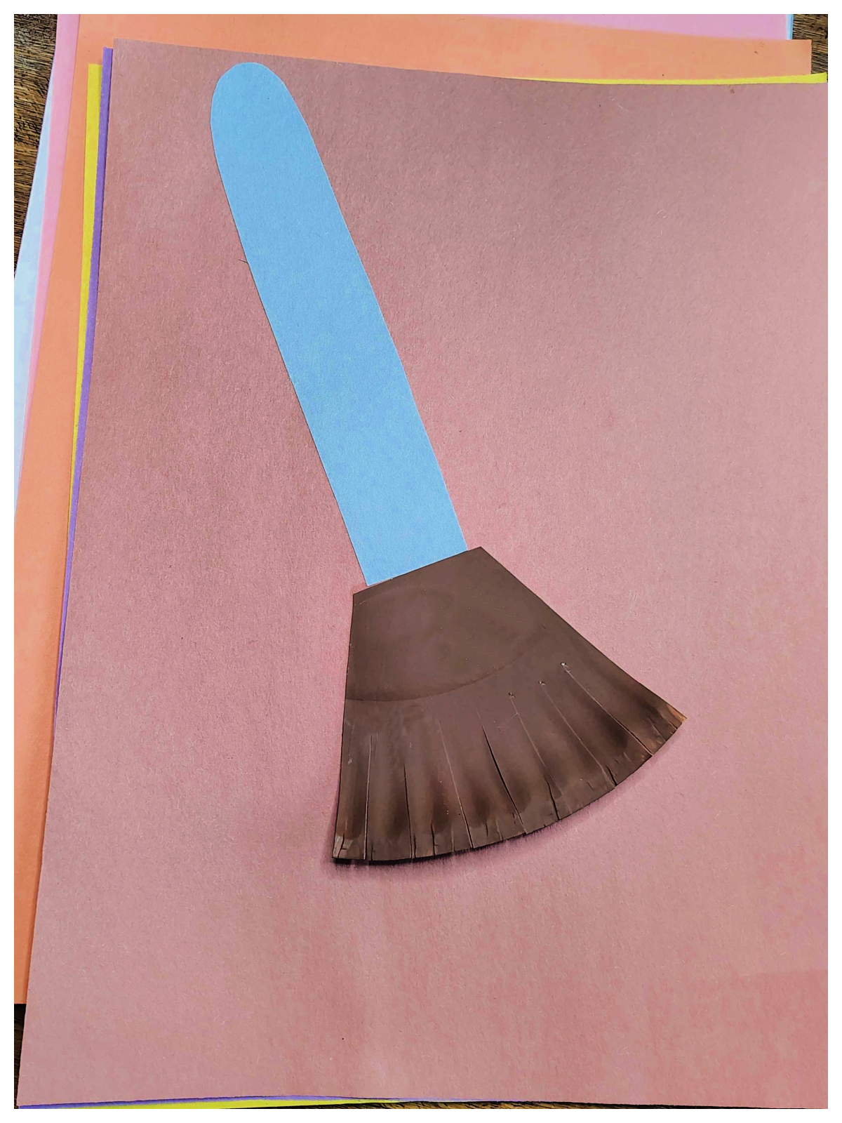 Leaf Craft- Step 5- Rake head and handle glued to paper - Kids Activities Blog