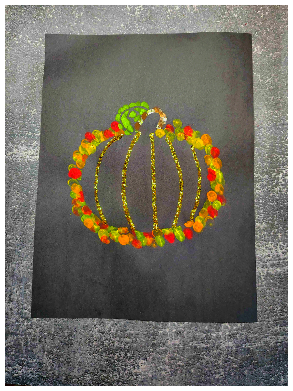 Pumpkin Craft- Step 5- Gold glitter added to glue- Kids Activities Blog