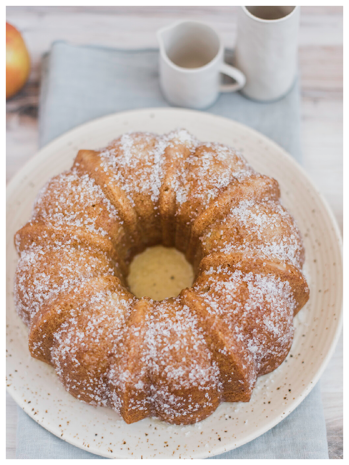 Apple Cider Recipes- cinnamon sugar bundt cake on a white plate -Kids Activities Blog