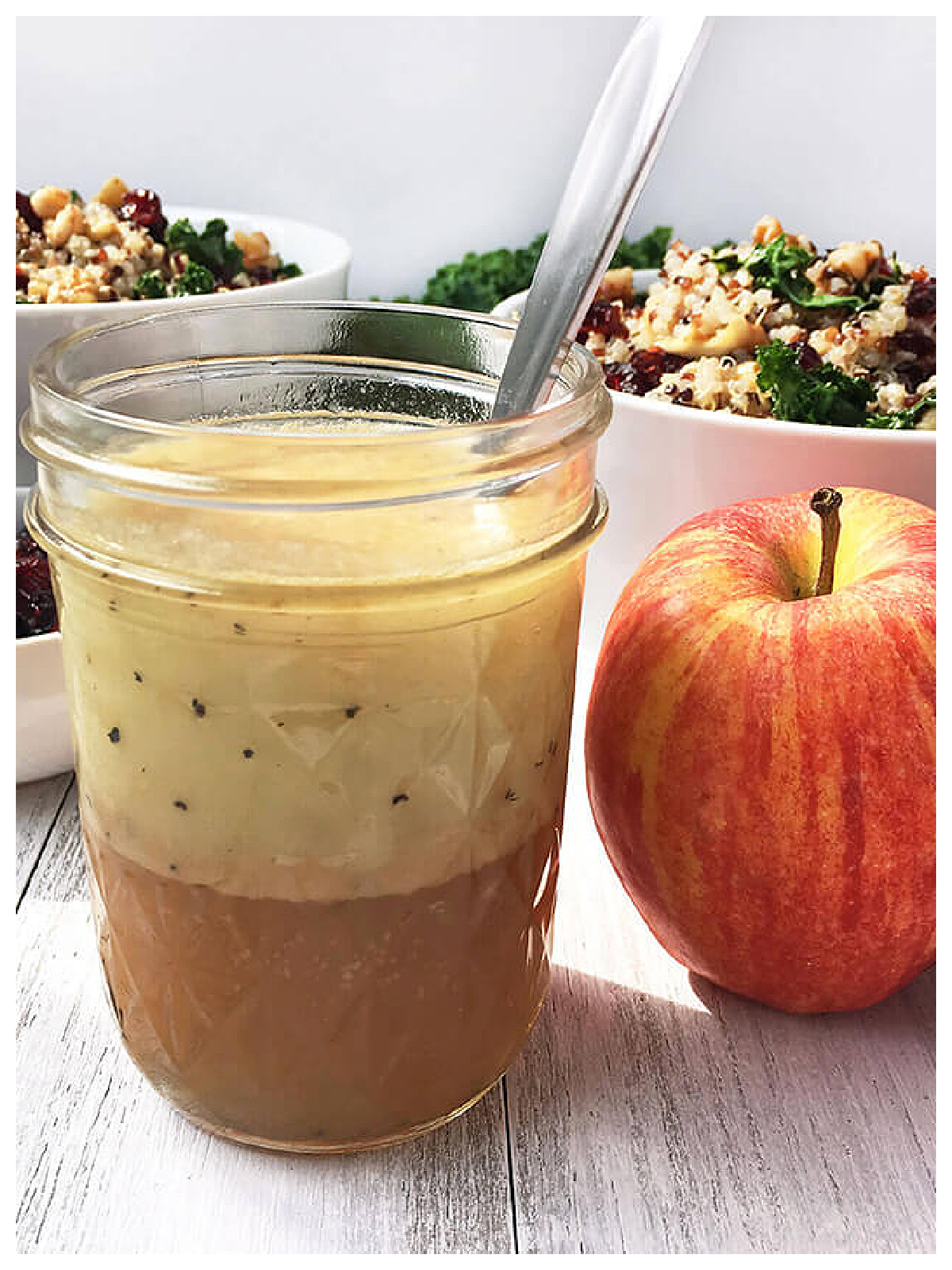 Apple Cider Recipes- dressing in a jar with a spoon salad and apple-Kids Activities Blog
