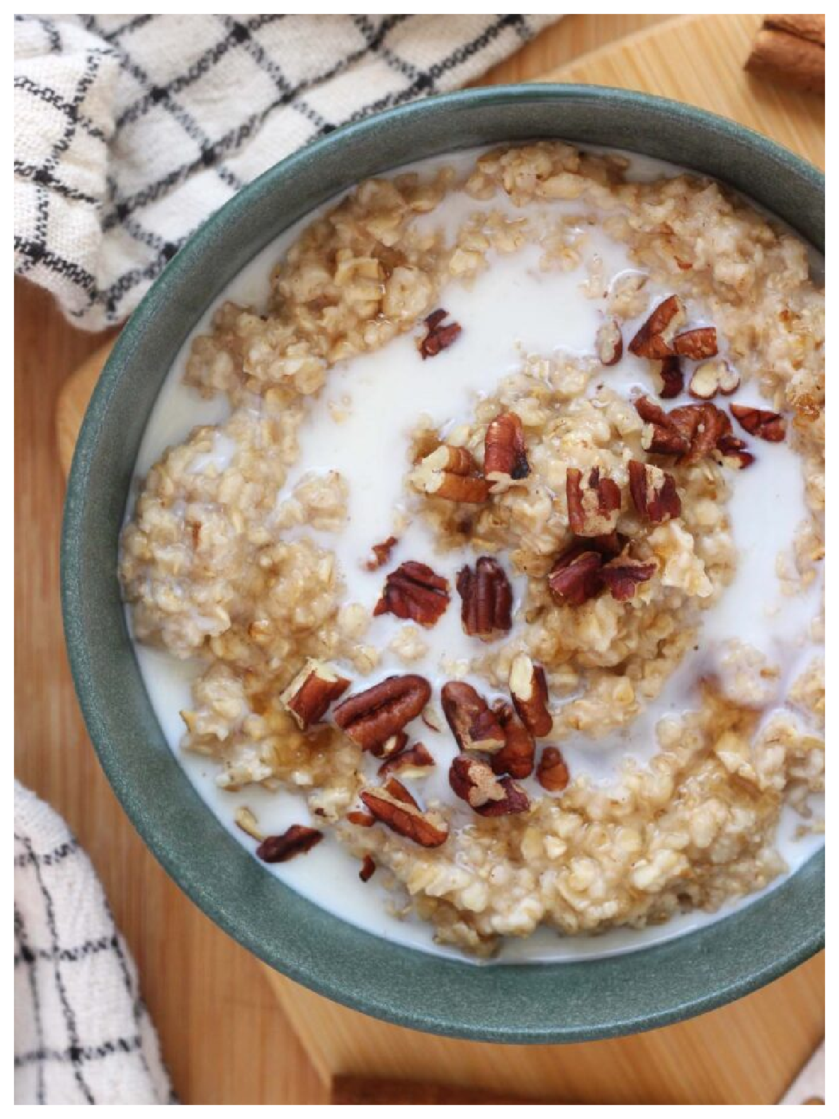 Maple Recipes - oatmeal in a green bowl a towel next to it, milk and nuts-Kids Activities Blog