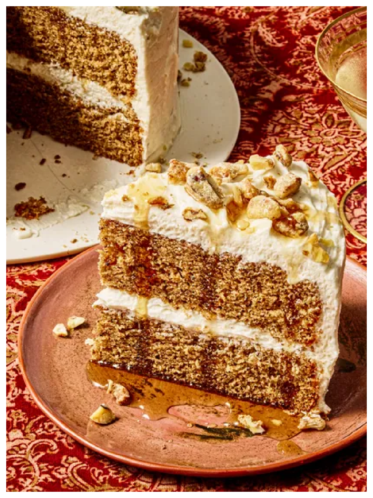 Maple Recipes - cake with nuts and icing on a red and gold table-Kids Activities Blog