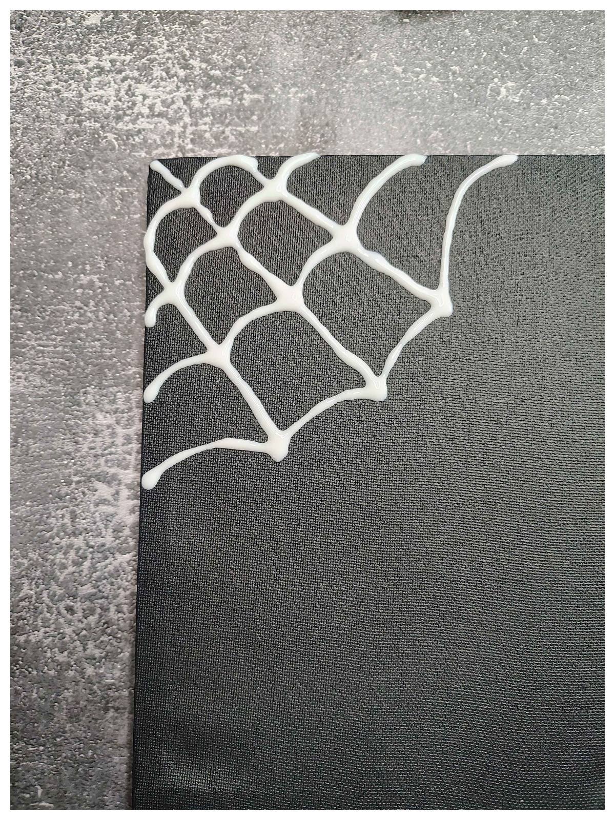 Spider Web Craft- Step 2 - Web made with glue on black canvas -Kids Activities Blog
