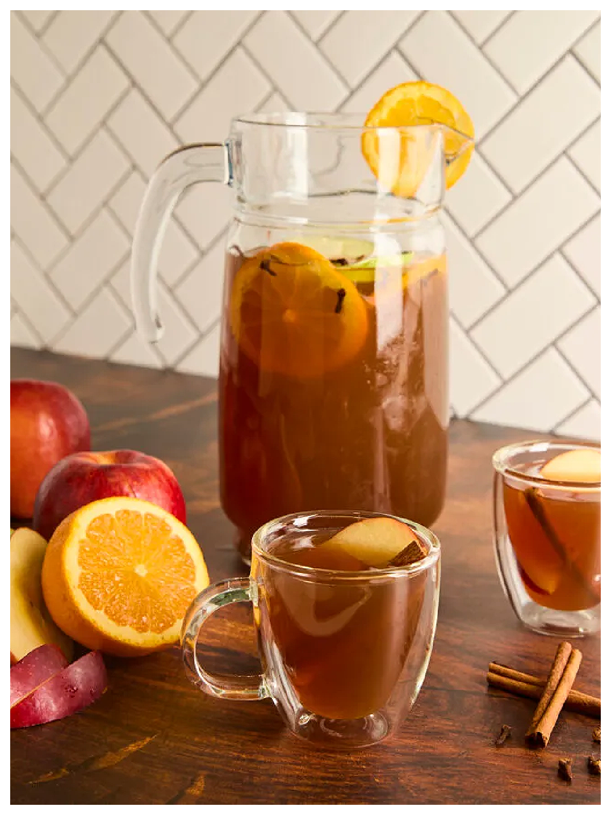 Apple Cider Recipes- pitcher or juice with herbs and fruit -Kids Activities Blog